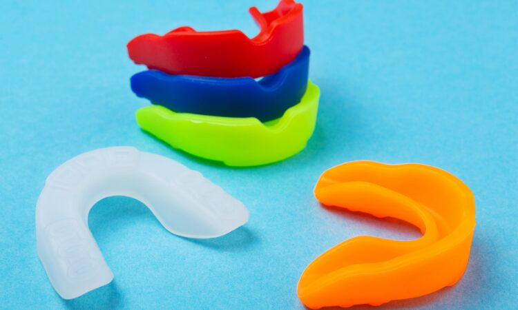 A custom mouthguard absorbs the impact of blows to the face, significantly reducing the risk of injury and protecting your smile.