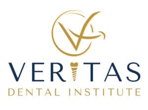 veritas dental institute logo